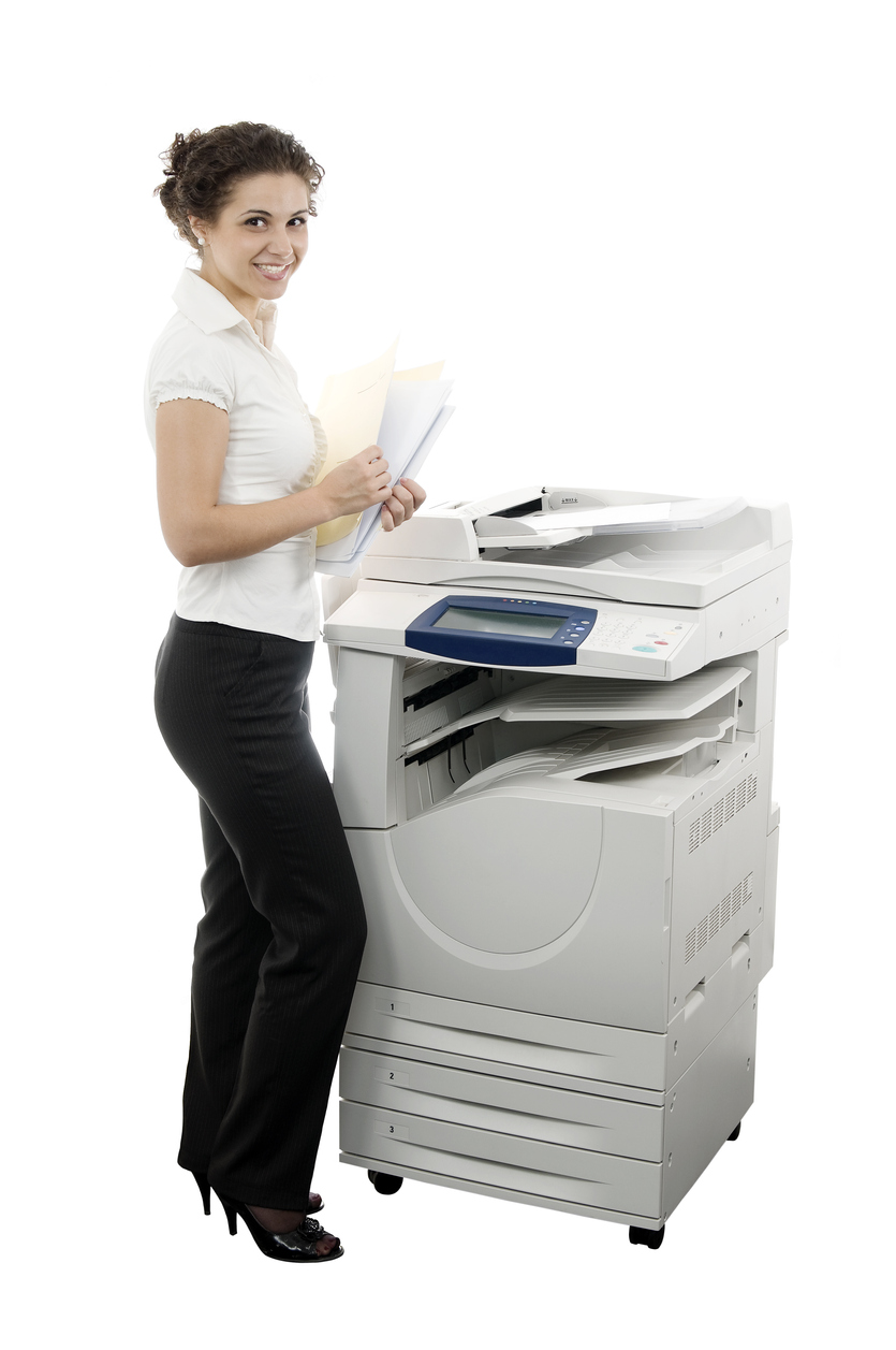 woman using fax machine